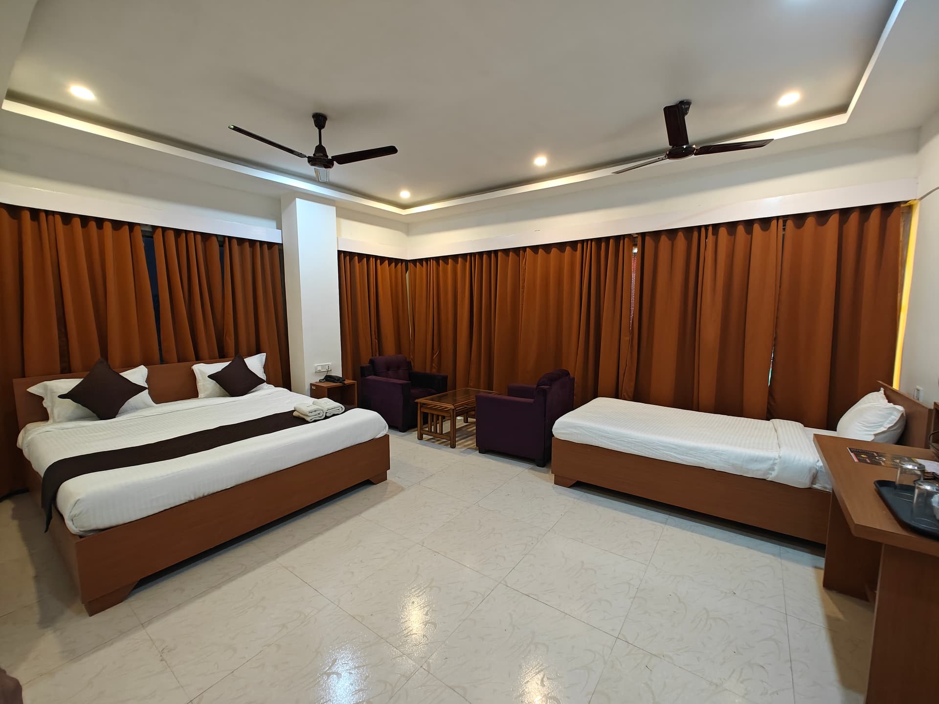 Super Deluxe Room — Premium Hotel Room near Nemcare Hospital and GMCH Guwahati
